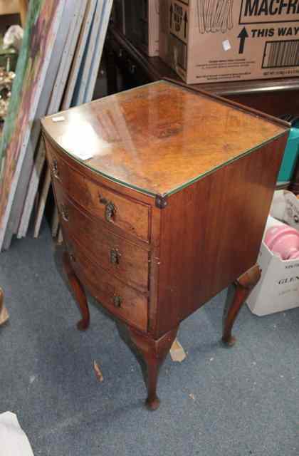 Appraisal: A TH CENTURY BURR WALNUT VENEERED BOW FRONTED BEDSIDE TABLE