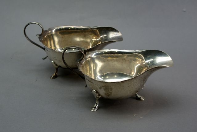 Appraisal: A pair of George V sterling silver footed gravy boats