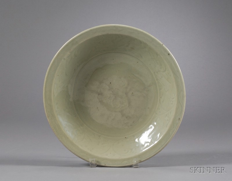 Appraisal: Celadon Bowl China Ming period th century surface carved with