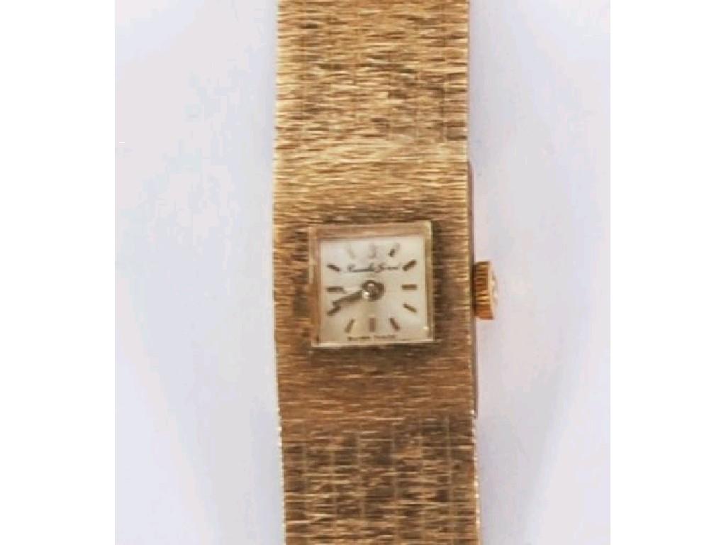 Appraisal: LADY'S BUECHE GIROD CT GOLD BROAD BRACELET WATCH with small