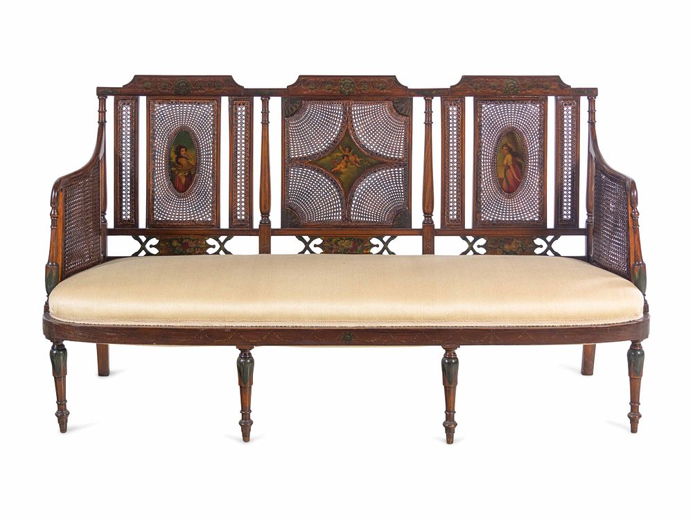 Appraisal: An Edwardian Painted Satinwood Caned Settee An Edwardian Painted Satinwood