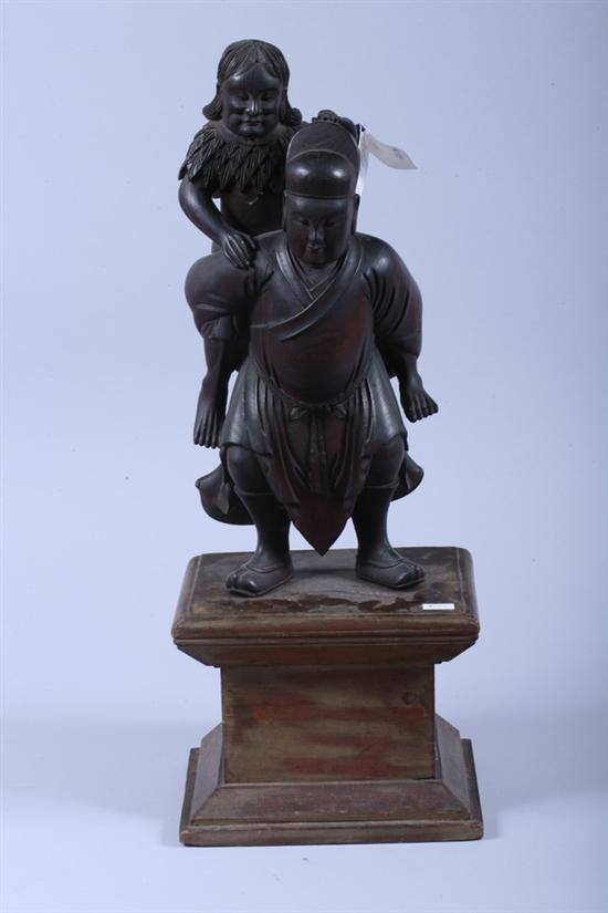 Appraisal: CHINESE WOOD FIGURE OF A MAN AND A WOMAN Circa