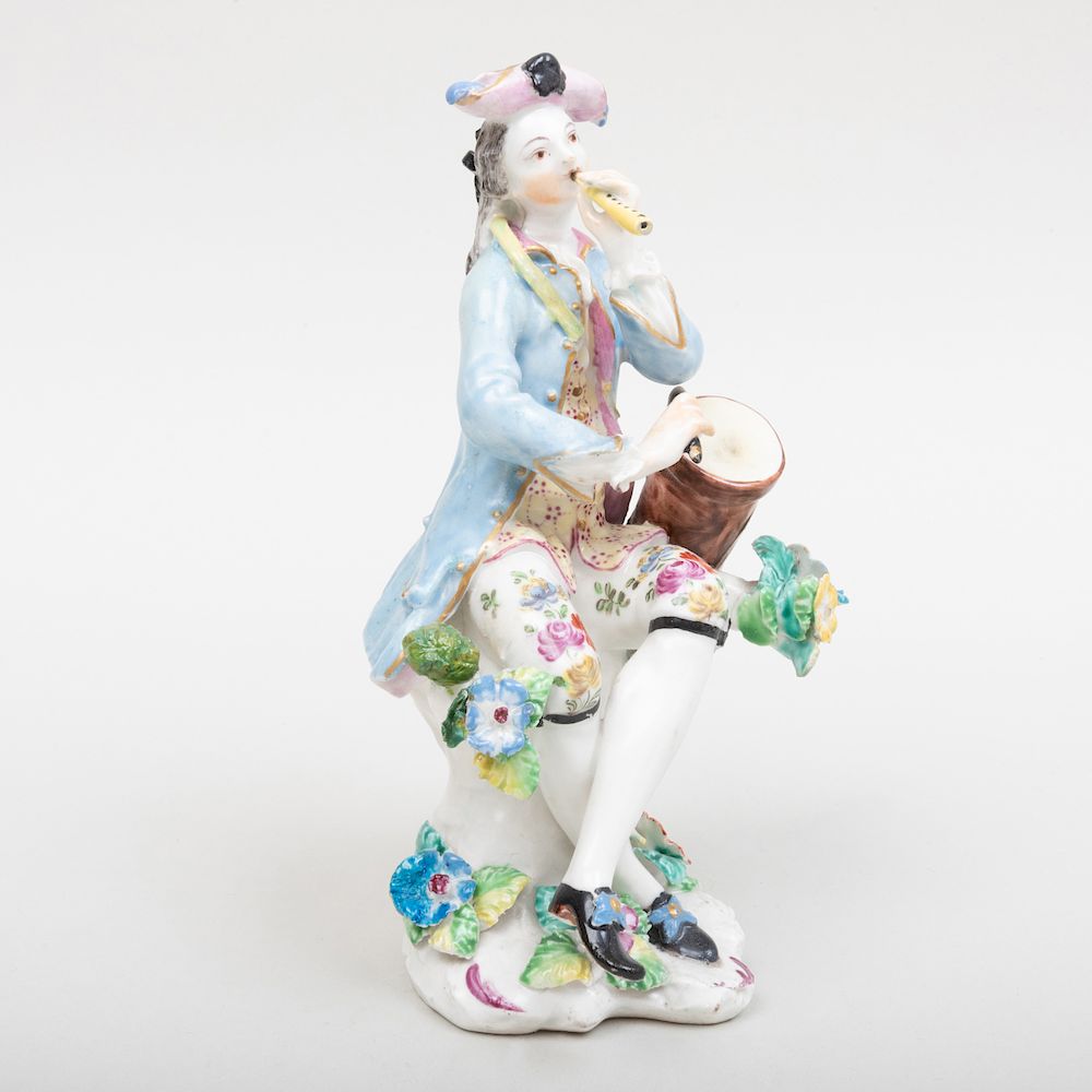 Appraisal: English Porcelain Figure of a Musician in high Condition Minor