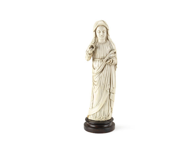 Appraisal: A large th century Indo-Portuguese carved ivory figure of the