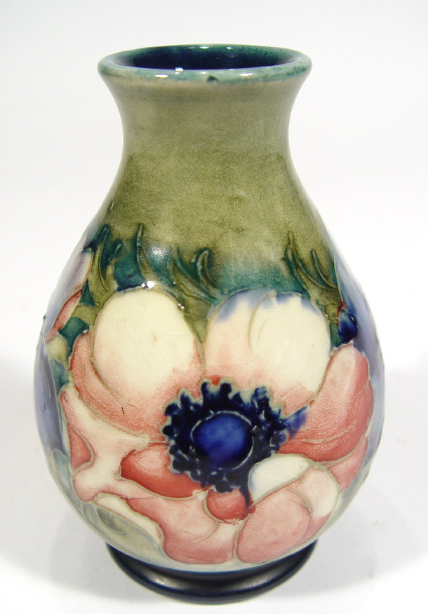 Appraisal: Small Moorcroft pottery vase hand painted and tubelined with anemones