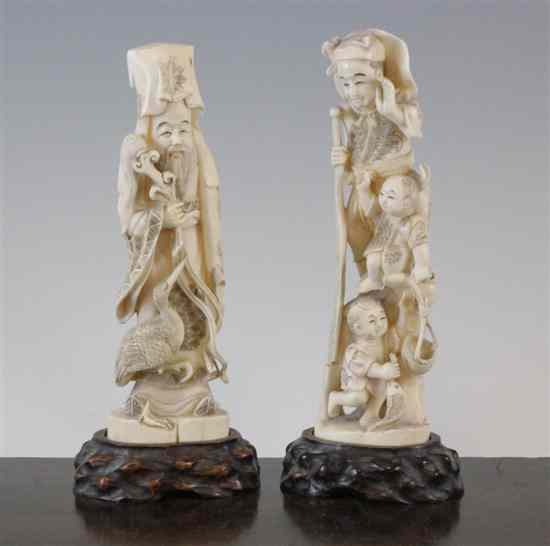 Appraisal: Two Japanese walrus ivory groups early th century the first