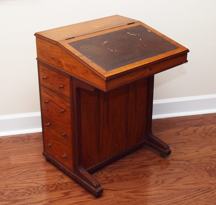 Appraisal: WALNUT DAVENPORT DESK Lift top with leather writing surface drawers