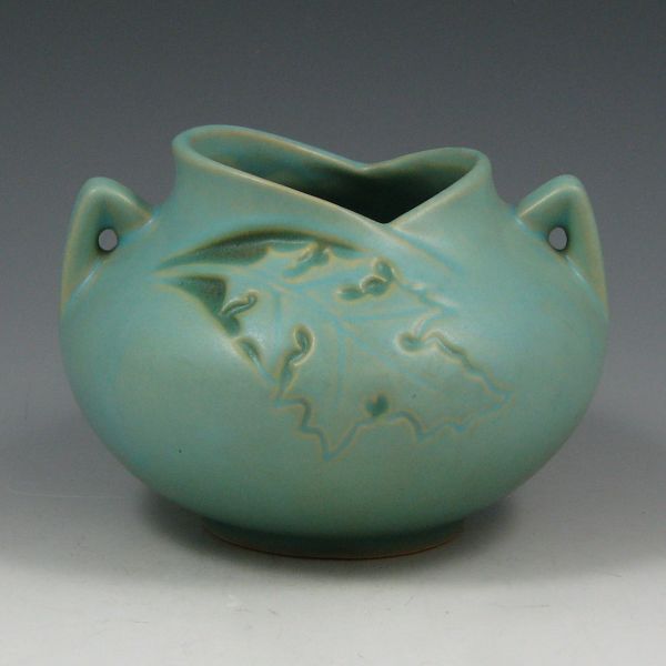 Appraisal: Roseville Silhouette rose bowl in light blue-green with oak leaves