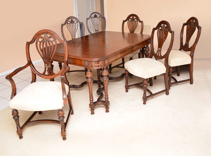 Appraisal: WEST END FURNITURE MAHOGANY DINING TABLE CHAIRS Expanding table skirt