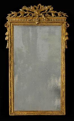 Appraisal: LOUIS XVI-STYLE CARVED GILTWOOD PIER MIRROR The -part plate within