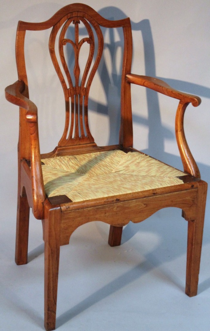 Appraisal: An early thC elm country Chippendale carver chair with a