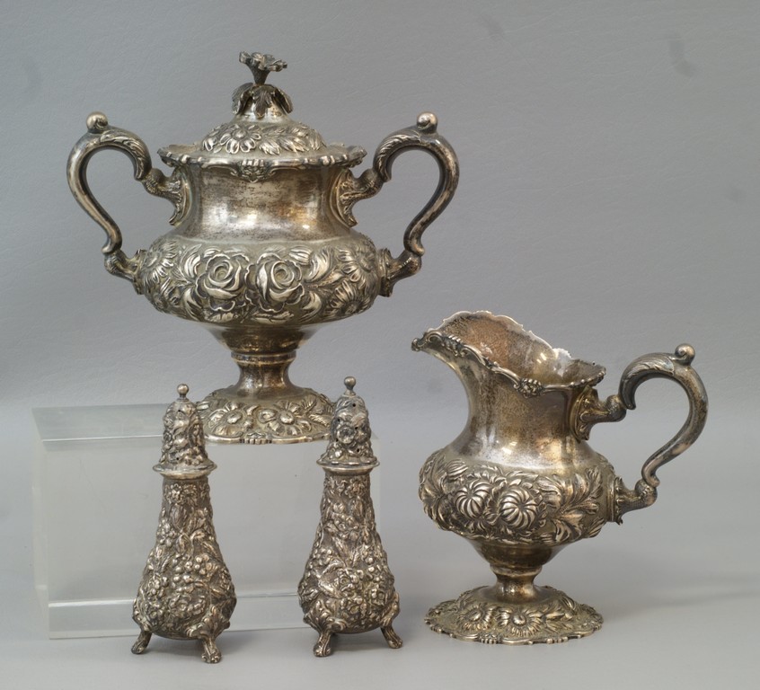 Appraisal: Stieff sterling silver floral repousse cream pitcher and covered sugar