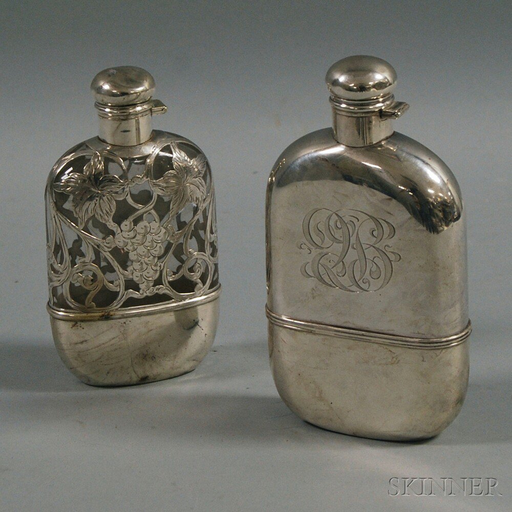 Appraisal: Two Sterling Silver-mounted Flasks th century an Alvin silver-sheathed -pint