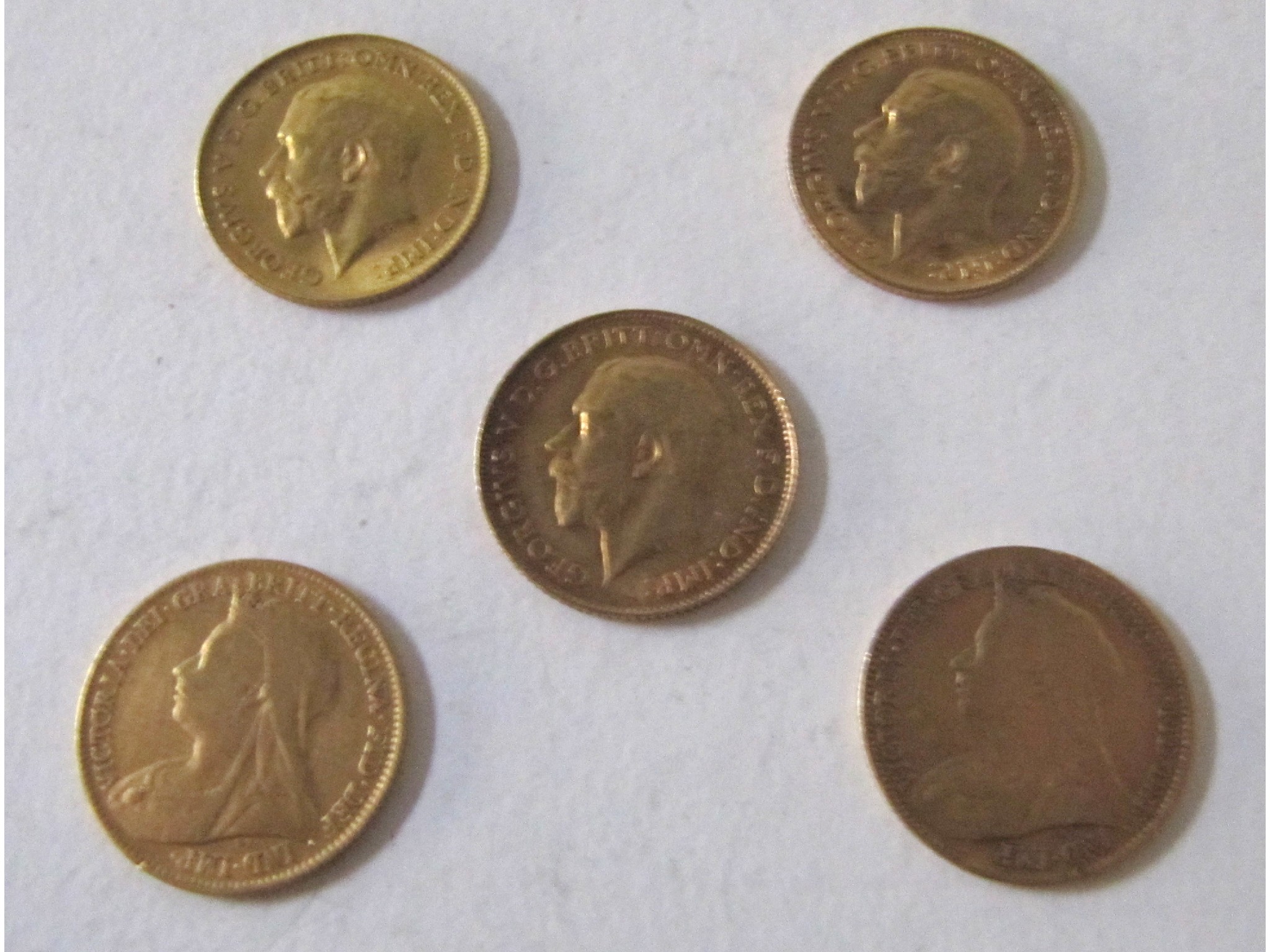 Appraisal: Five gold half sovereigns Queen Victoria fair two edge knocks