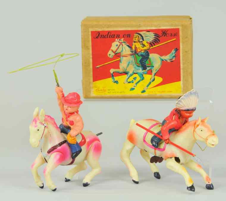 Appraisal: CELLULOID COWBOY AND INDIAN TOYS Japan colorful depictions of mounted