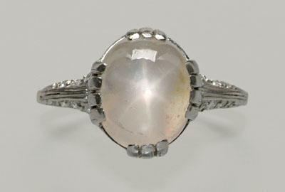 Appraisal: White star sapphire diamond ring central cabochon sapphire estimated weight