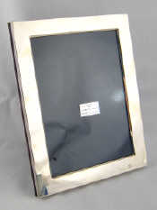 Appraisal: A silver photo frame with strut back x cm in