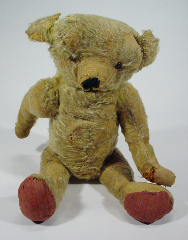 Appraisal: Edwardian jointed golden teddy bear with beaded glass eyes cm