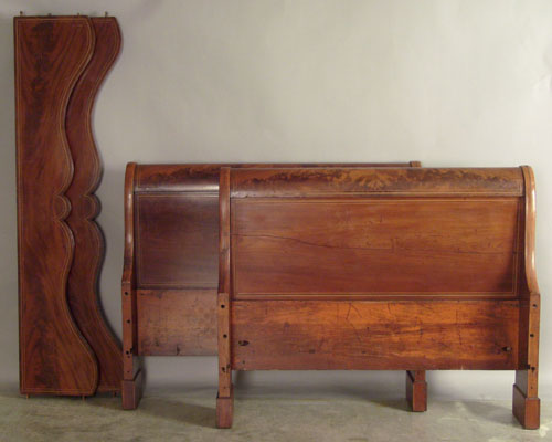 Appraisal: Empire mahogany sleigh bed th c