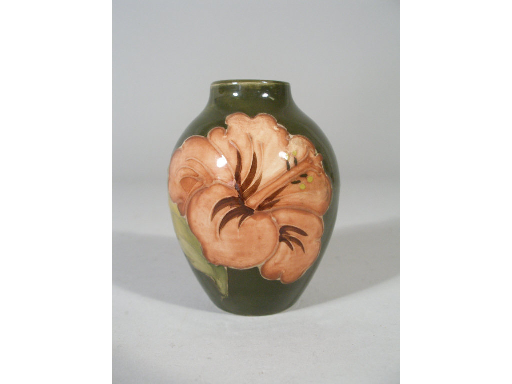 Appraisal: Moorcroft Hibiscus Cabinet Vase green field w hand painted flower