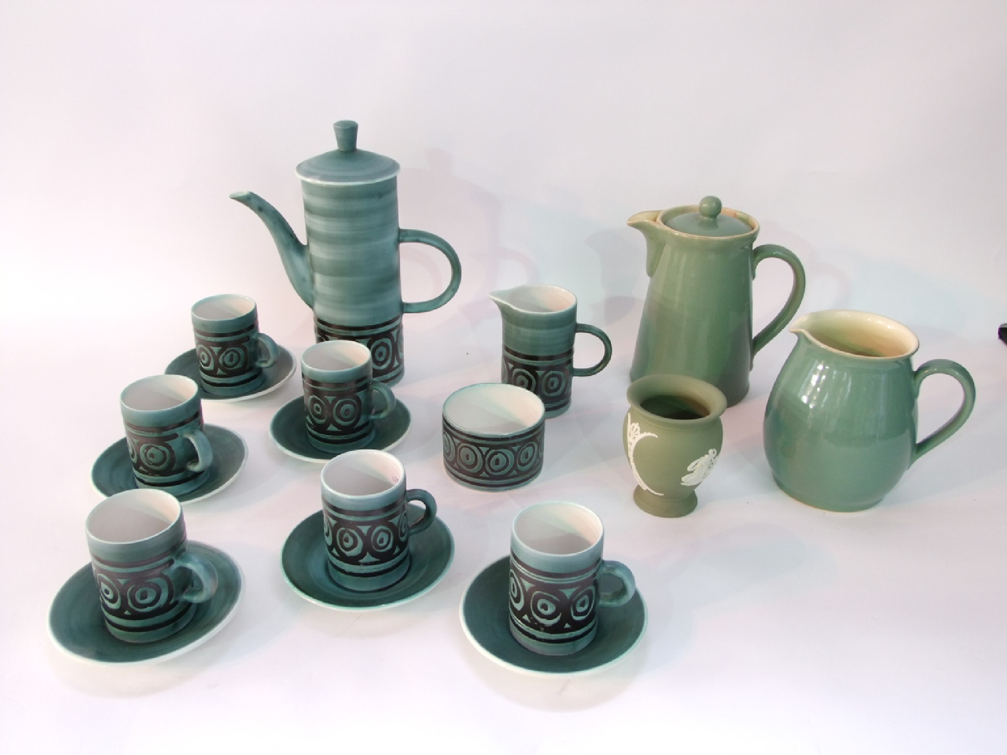 Appraisal: A Rye pottery coffee set with black painted concentric circle