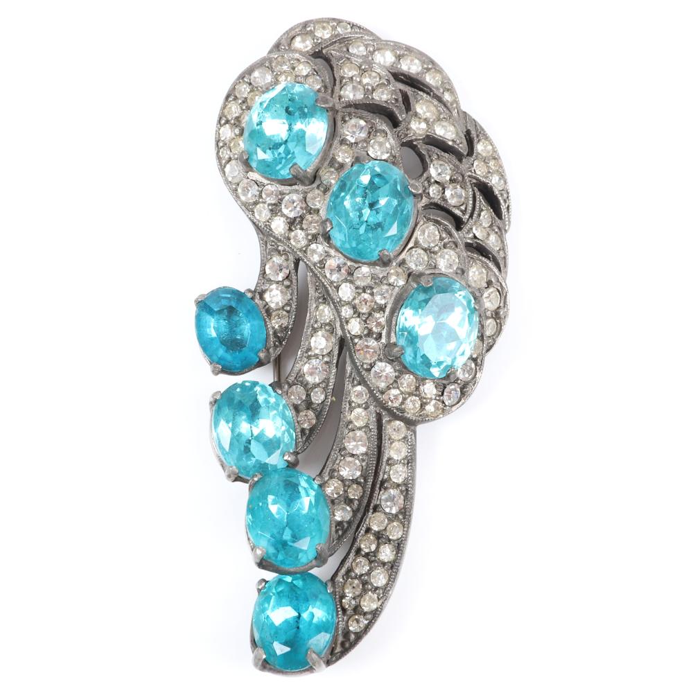 Appraisal: EISENBERG ORIGINAL ABSTRACT CLIP WITH SEVEN LARGE FACETED AQUA BLUE