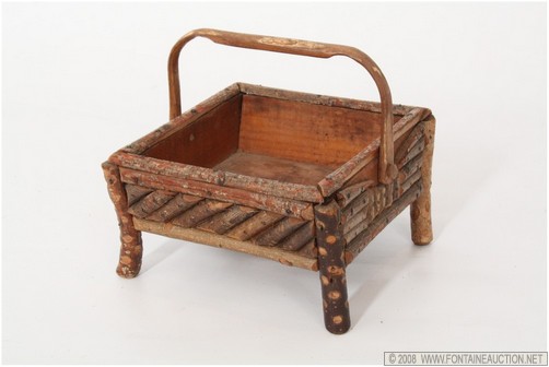 Appraisal: SWINGING HANDLE TWIG BASKET W x H x D