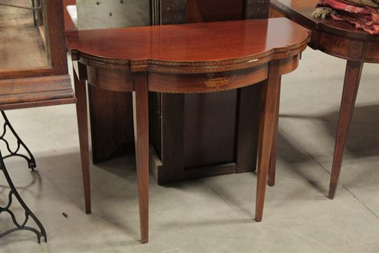 Appraisal: GAME TABLE Flip top mahogany table with serpentine front and