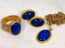 Appraisal: A suite of jewellery comprising a lapis lazuli set pendant