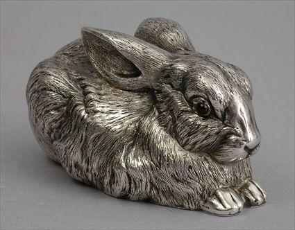 Appraisal: RUSSIAN SILVER FIGURE OF A RABBIT With garnet eyes with