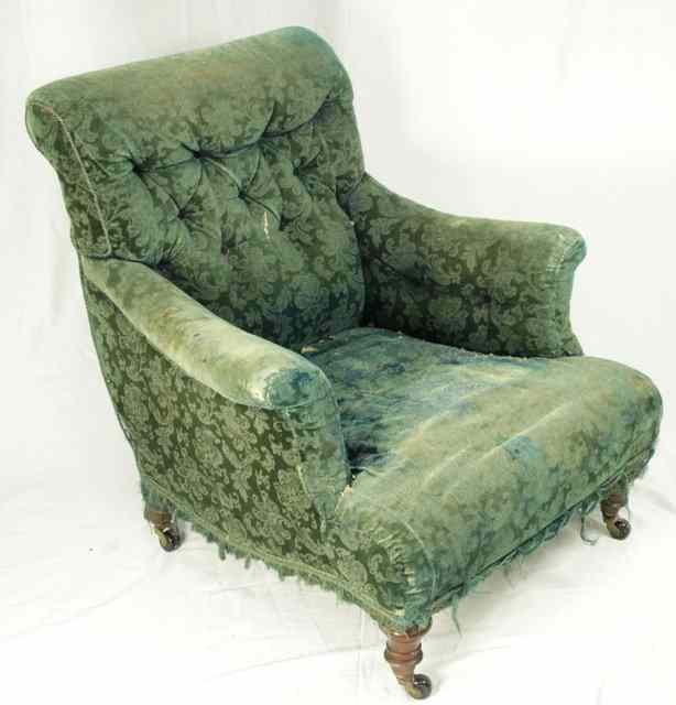 Appraisal: A Victorian upholstered armchair on turned legs