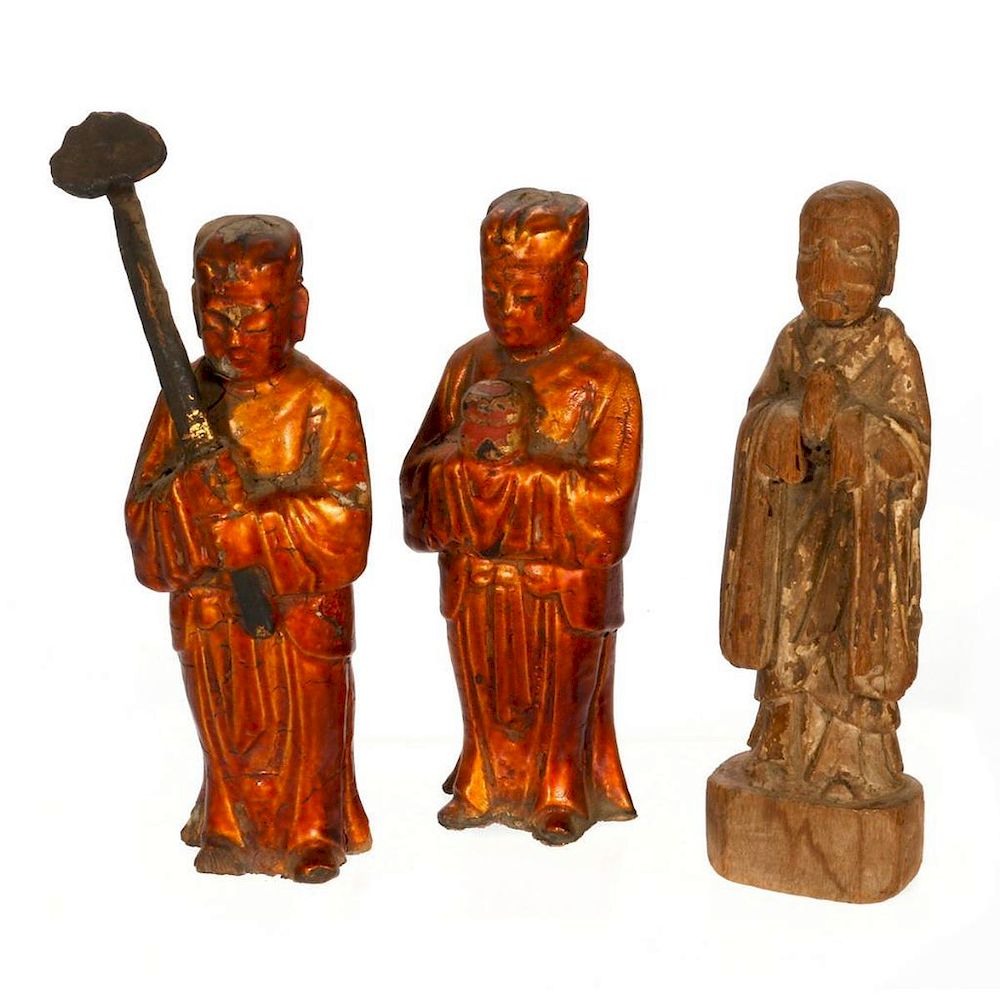 Appraisal: Three carved Chinese figures Three carved wooden th century Chinese