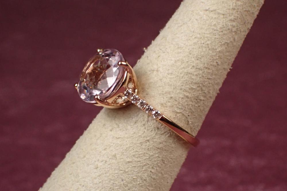 Appraisal: ROSE QUARTZ DIAMOND AND FOURTEEN KARAT GOLD RING The rose