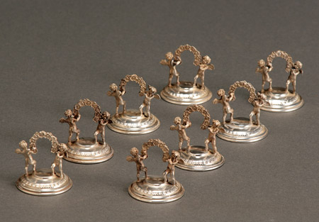 Appraisal: Set of Eight Italian Silver Figural Place Card Holders Circa