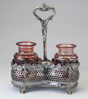 Appraisal: Ruby crystal decanters w silverplate holder Pair of ruby red