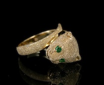 Appraisal: A Ladies' Gold Cat Ring with Emeralds k textured yellow