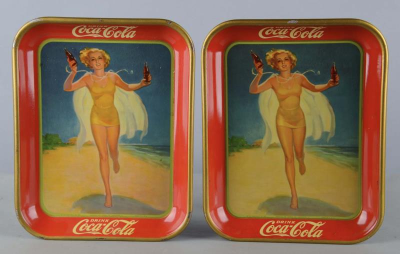 Appraisal: Lot Of Coca Cola Tin Serving Trays This lot includes