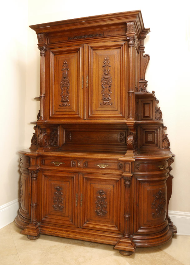 Appraisal: IMPRESSIVE MID-VICTORIAN CARVED SIDEBOARD Top with applied carved decoration doors