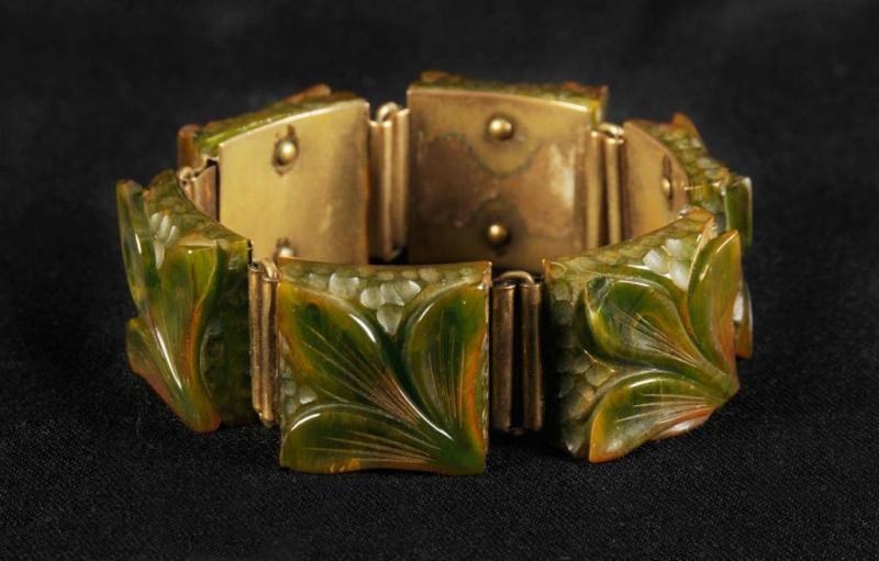 Appraisal: Bakelite Floral Flexible Bracelet Description On brass backing Condition Excellent