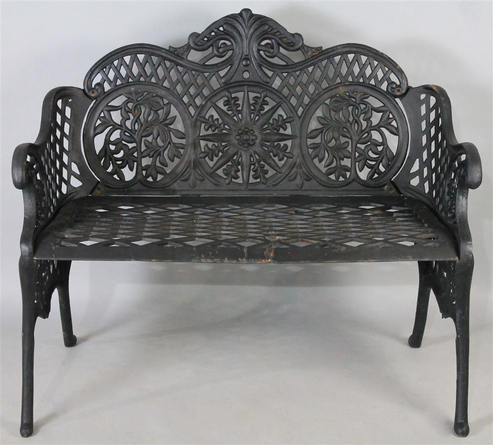 Appraisal: BLACK PAINTED WROUGHT IRON GARDEN BENCH having an arched and