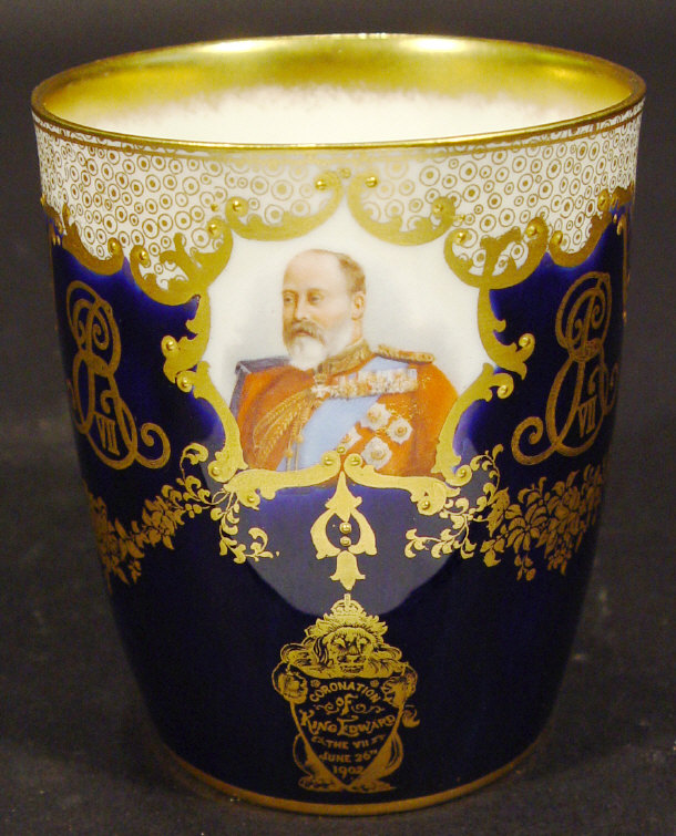 Appraisal: Royal Doulton bone china commemorative beaker printed with portrait panels