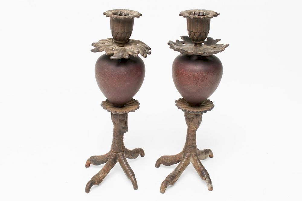 Appraisal: Cast Iron Claw Talon Foot Candle Holders Pair of vintage