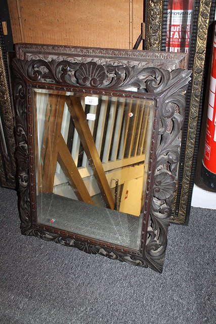 Appraisal: A VICTORIAN CARVED OAK WALL MIRROR with foliate frame cm