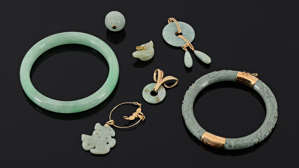 Appraisal: ESTATE FOUND JADEITE JADE BRACELETS AND PENDANTS Carved K gold