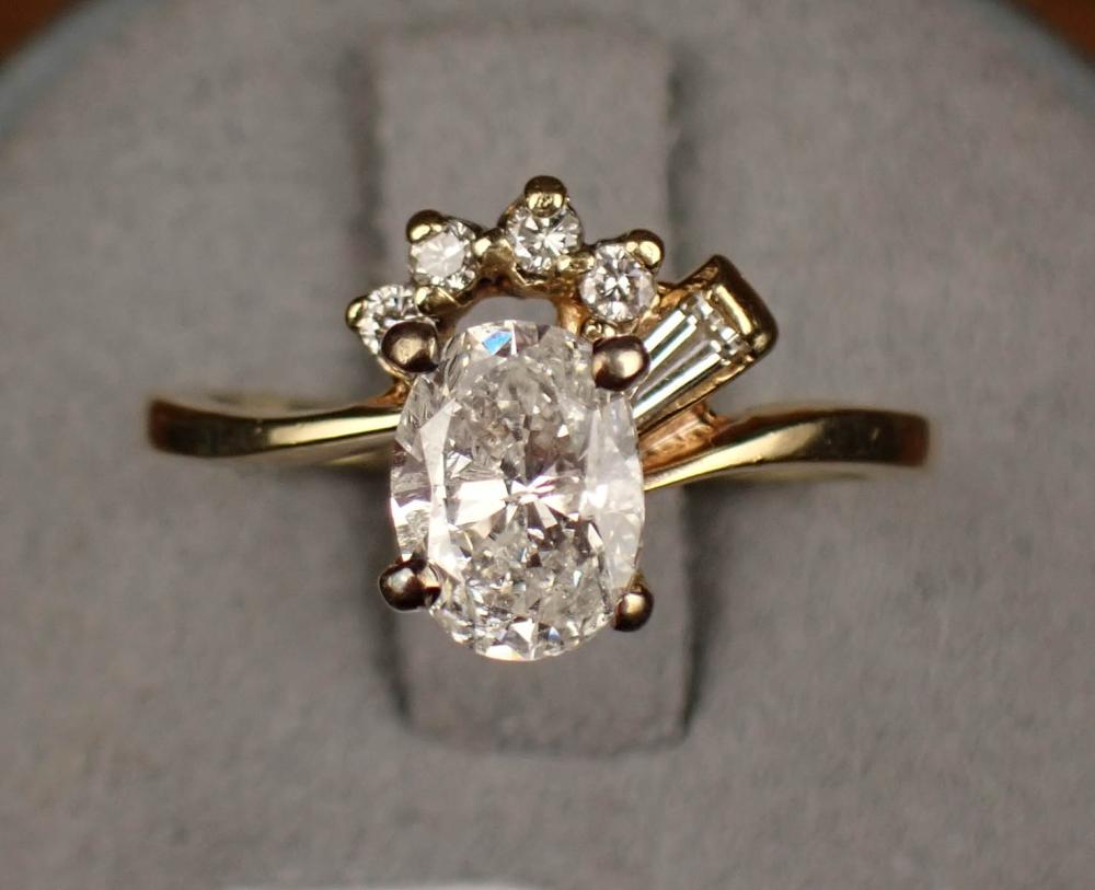 Appraisal: ESTATE DIAMOND AND FOURTEEN KARAT GOLD RING The k yellow