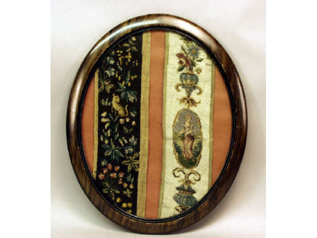 Appraisal: Antique needlepoint samplers in old oval frame Estimate -