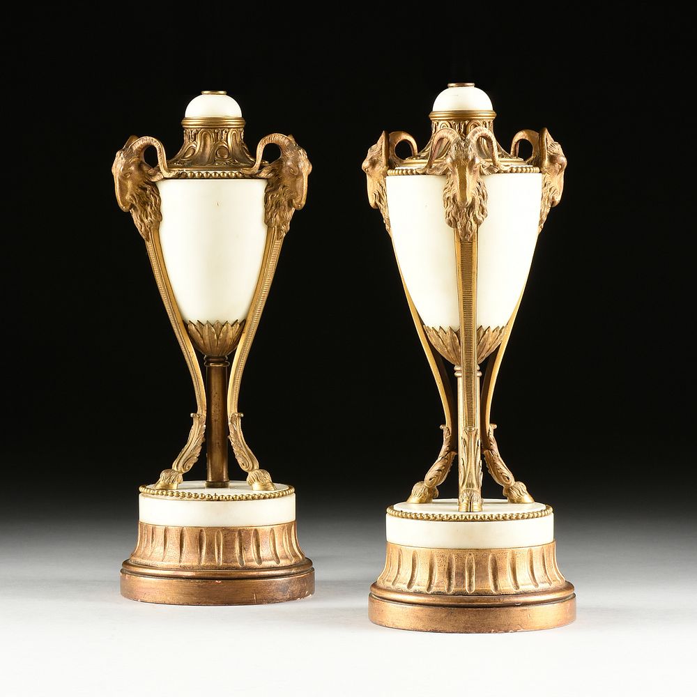 Appraisal: A PAIR OF LOUIS XVI STYLE GILT BRONZE MOUNTED WHITE