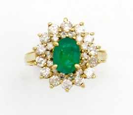 Appraisal: A ct gold emerald and diamond cluster ring size M