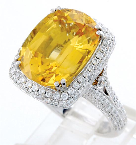 Appraisal: Yellow sapphire ring oval sapphire ct and two hundred forty-two