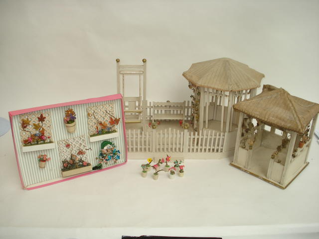 Appraisal: Miniature painted wooden garden and Gazebos The painted cream and